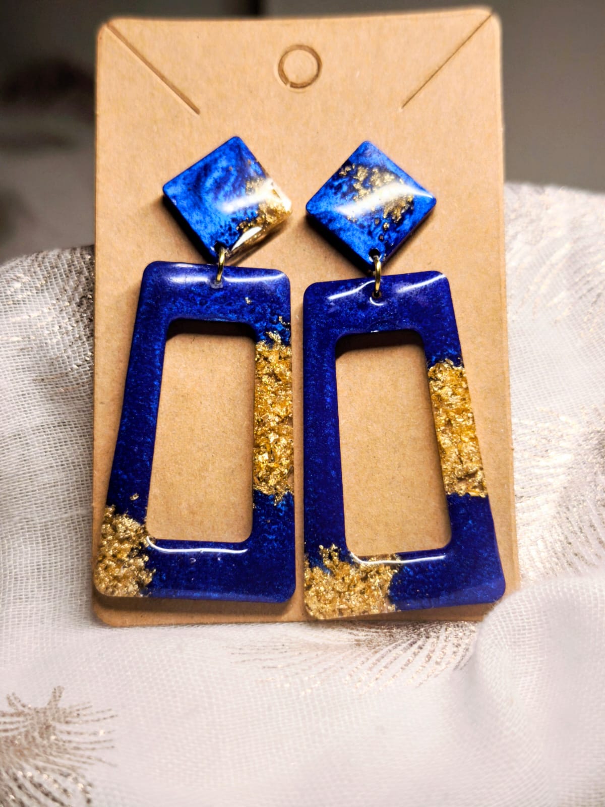 Boucle d'oreille bleu et or