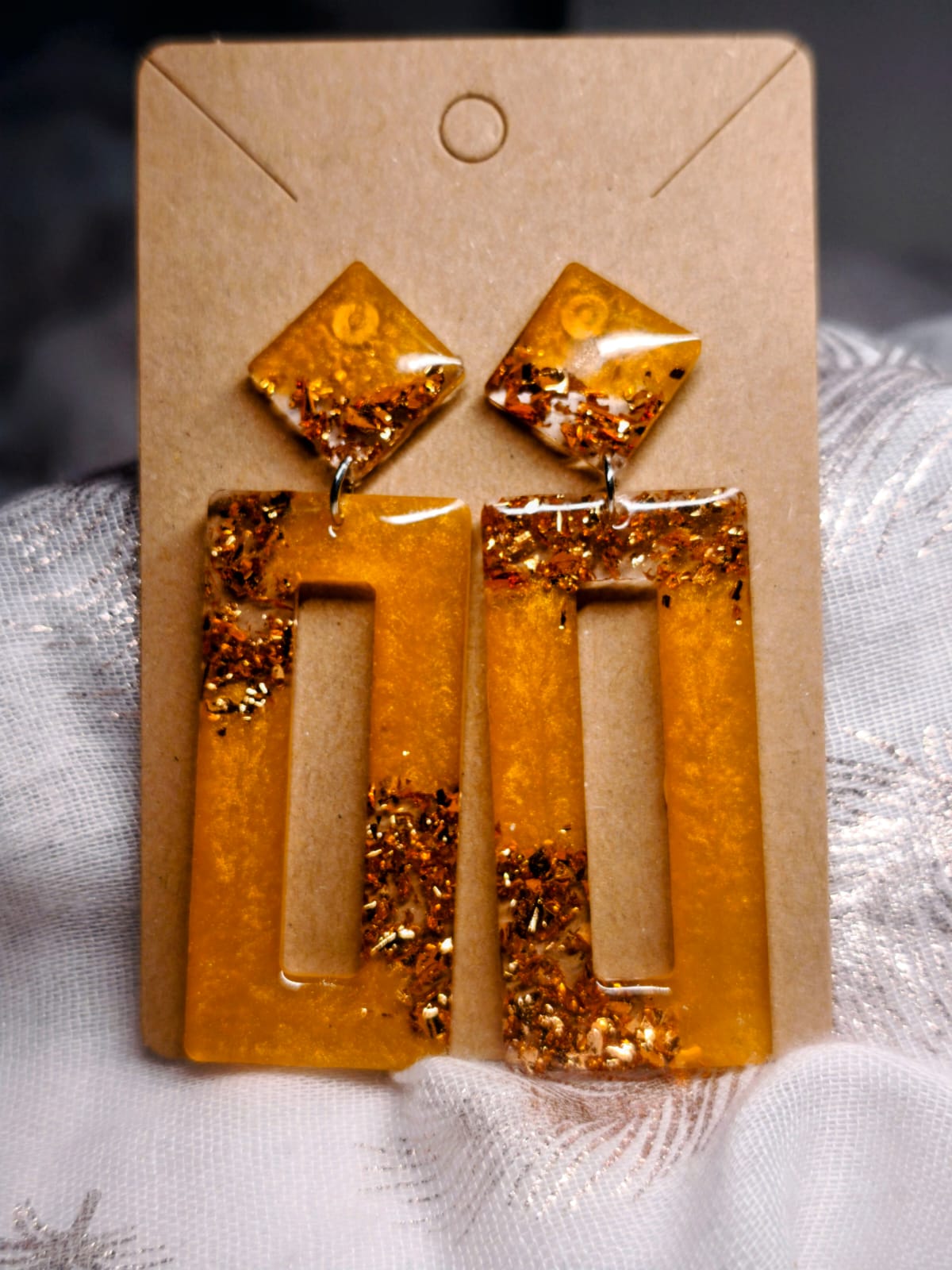 Boucle d'oreille orange et or