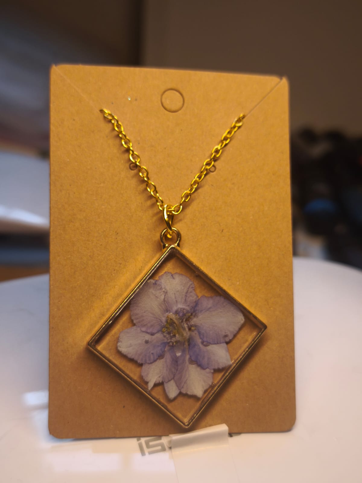 Pendentif carré floral