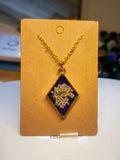 Pendentif losange floral