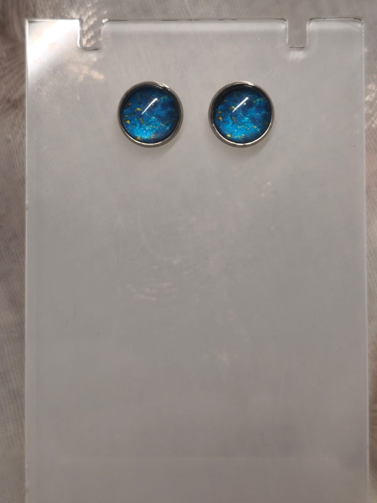 Clou d'oreille bleu ciel